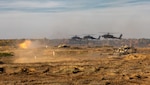 3 Apache helicopters and two Abrams tanks shoot live fire during exercise Victory Eagle in Poland.