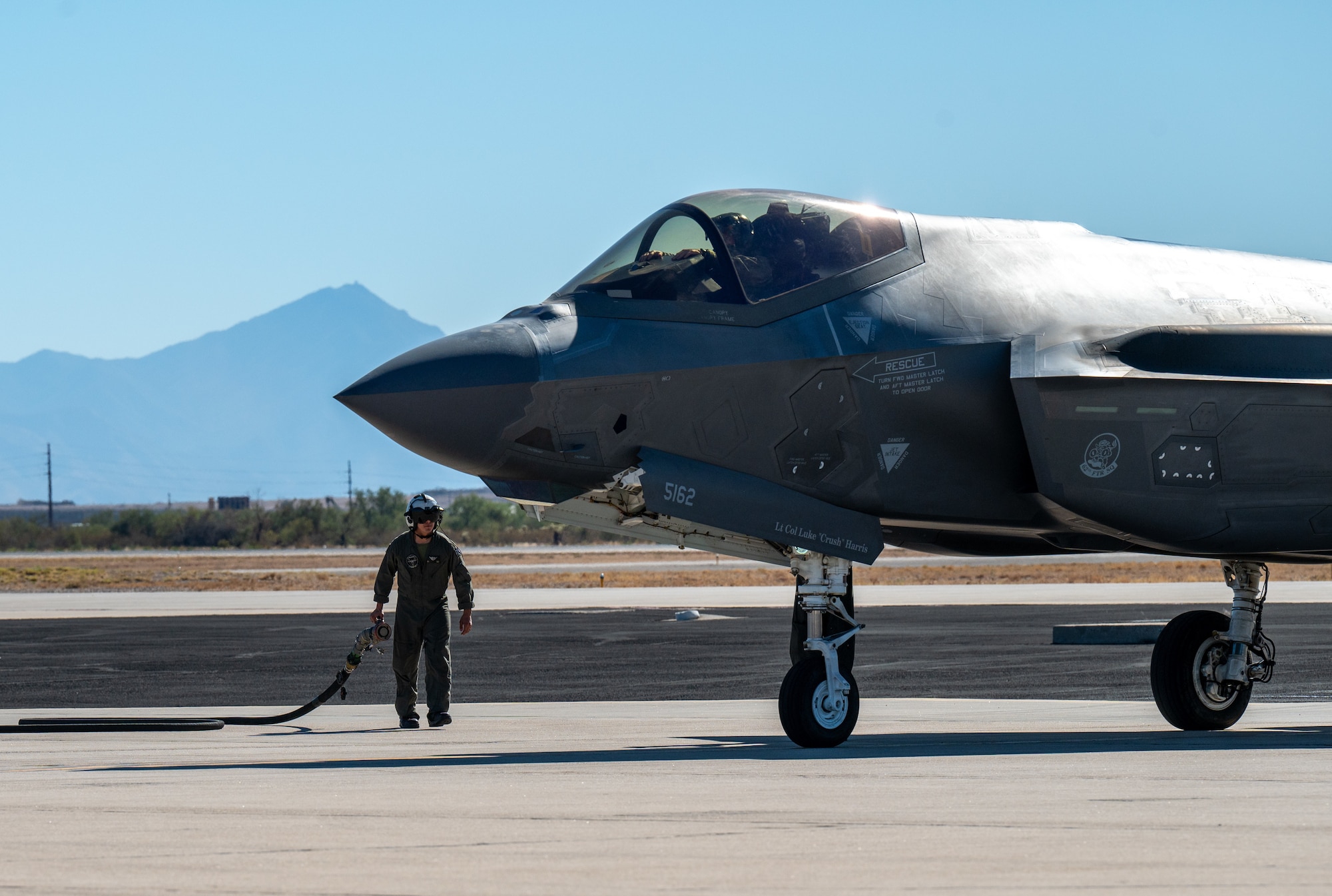 U.S. Marines refuel an F-35 Lightning II aircraft, assigned to the 56th Fighter Wing’s 62nd Fighter Squadron, on the flightline at Davis-Monthan Air Force Base, Ariz., Nov. 14, 2024. The Marines and F-35s participated in Exercise Desert Hammer 25-1, to include a forward area refueling point training. (U.S. Air Force photo by Senior Airman Devlin Bishop)