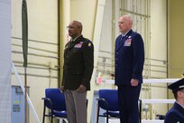Maj. Gen. Rodney Boyd, The Adjutant General for Illinois and Commander of the Illinois National Guard (right) and Brig. Gen. Daniel R. McDonough, Assistant Adjutant General - Air, Illinois National Guard (left) stand at the position of attention at McDonough’s promotion at the Peoria Air National Guard Base, Peoria, Illinois Nov. 27.