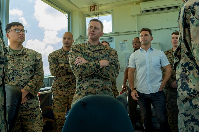 U.S. Marine Corps Col. Peter B. Eltringham, 12th Marine Littoral Regiment commanding officer, inspects the work of Marines from the 3rd Intelligence Battalion as part of Keen Sword 25, Oct. 27, 2024 at Ie Shima, Okinawa, Japan. Keen Sword is a biennial, joint and bilateral field-training exercise involving U.S. military and Japan Self-Defense Force personnel, designed to increase readiness and interoperability while strengthening the ironclad U.S.-Japan alliance. During Keen Sword, the Marine Corps Warfighting Laboratory leveraged the exercise environment to work with emerging concepts, technologies, and capabilities, providing valuable insights to advance joint interoperability and operational effectiveness in support of the U.S.-Japan alliance. (U.S. Marine Corps photo by Kevin Ray J. Salvador)