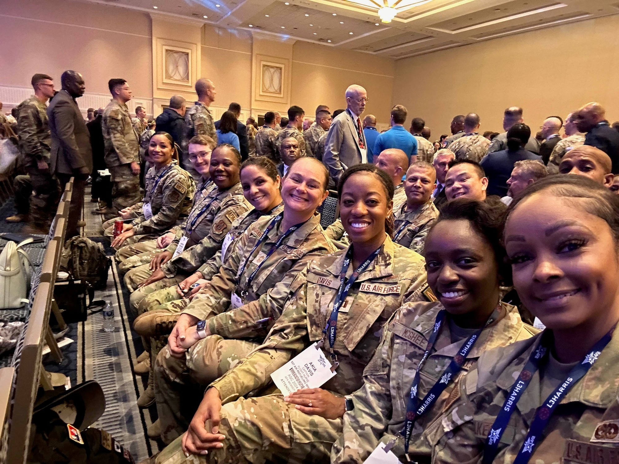People seated in a row.
