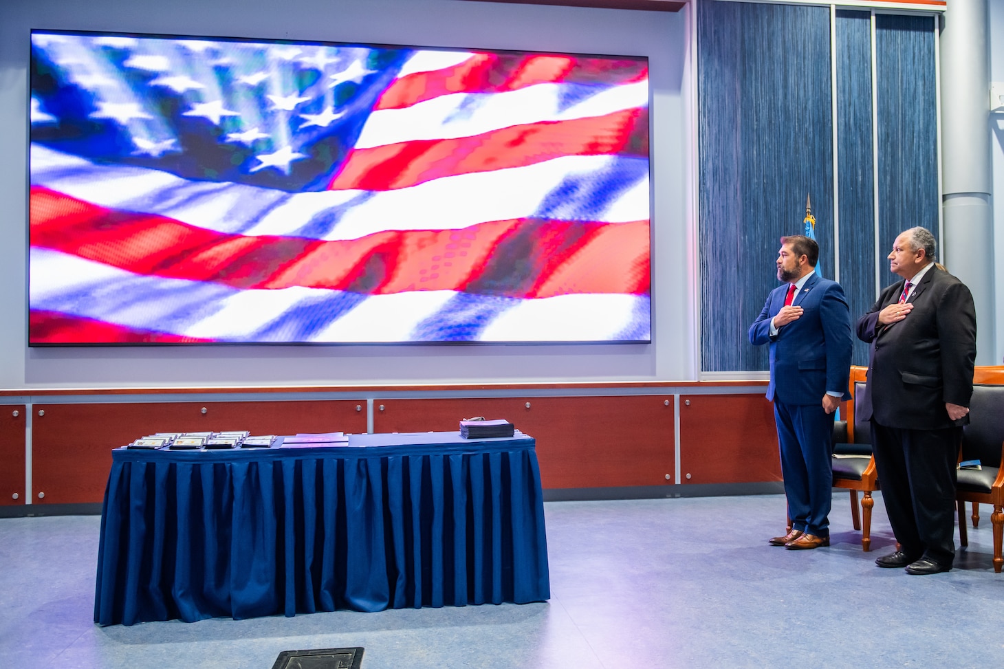 The Honorable Secretary of the Navy Carlos Del Toro (right) and Naval Criminal Investigative Service Director Omar Lopez at the graduation ceremony.