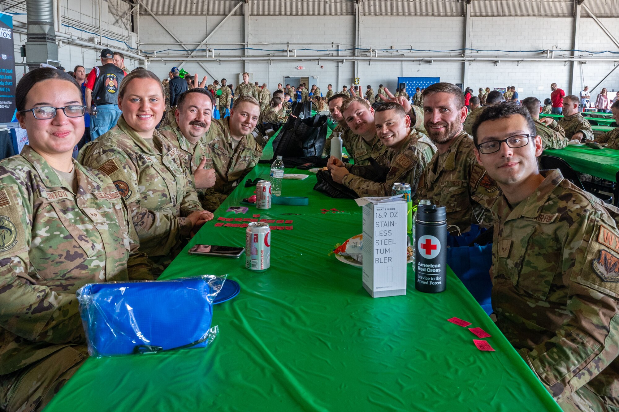 Service members pose for a photo.