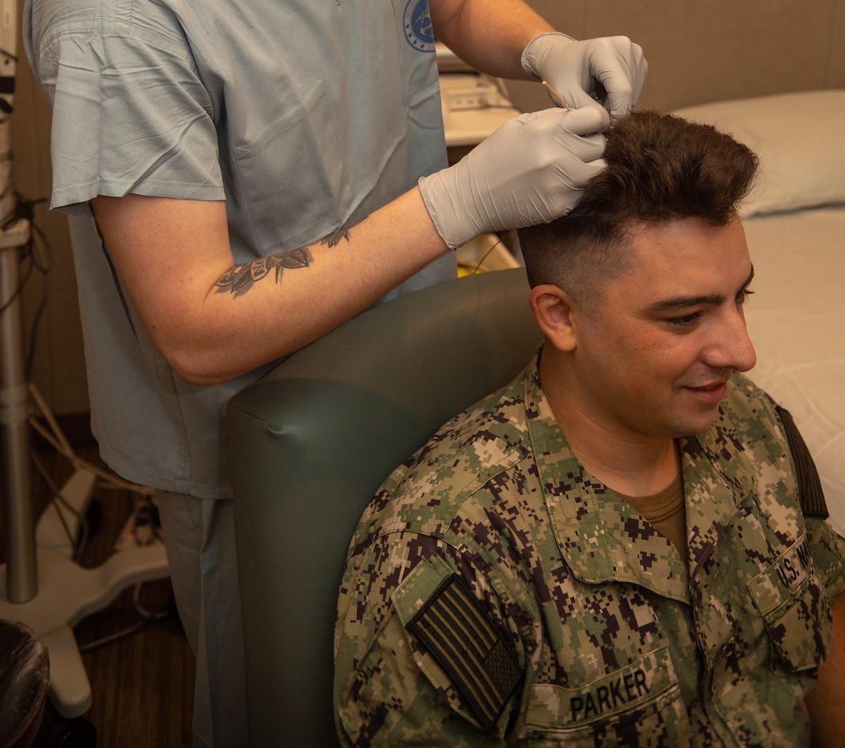 190916-N-LW757-1005

SAN DIEGO (Sept. 16, 2019) Hospitalman Zachary Rector, an electroneurodiagnostic technician assigned to Naval Medical Center San Diego (NMCSD), prepares Hospitalman Apprentice Ryan Parker’s scalp for application of electrodes for an electroencephalogram (EEG) test in the neurology clinic at the hospital Sept. 16. An EEG screens the brain for neurological disorders such as seizures and epilepsy. The neurology clinic supports NMCSD's mission by preparing service members to deploy in support of operational forces, deliver high quality healthcare services and shape the future of military medicine through education, training, and research. NMCSD employs more than 6,000 active duty military personnel, civilians and contractors in Southern California to provide patients with world-class care anytime, anywhere. (U.S. Navy photo by Mass Communication Specialist Seaman Apprentice Luke Cunningham)