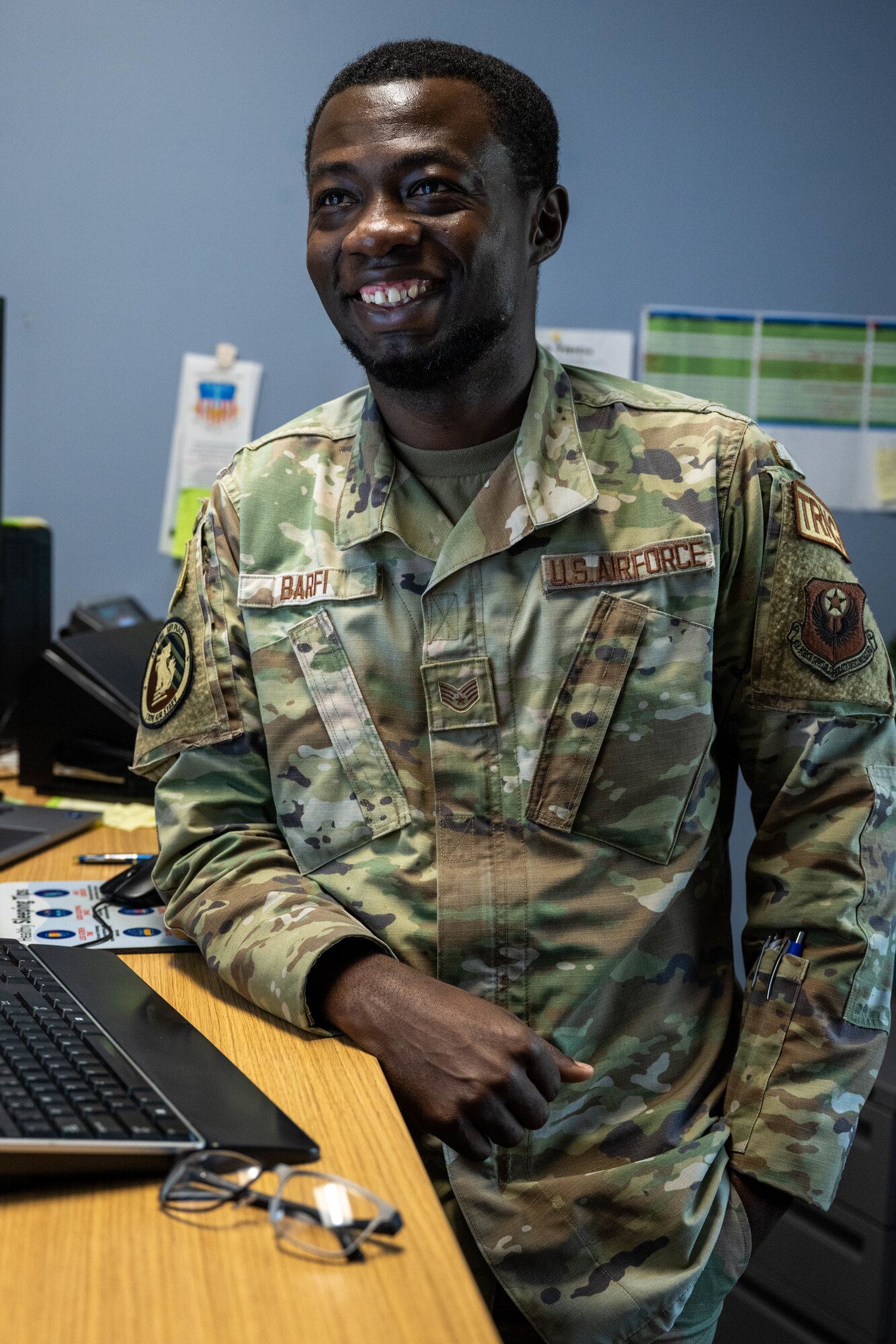 An Airman poses for a photo