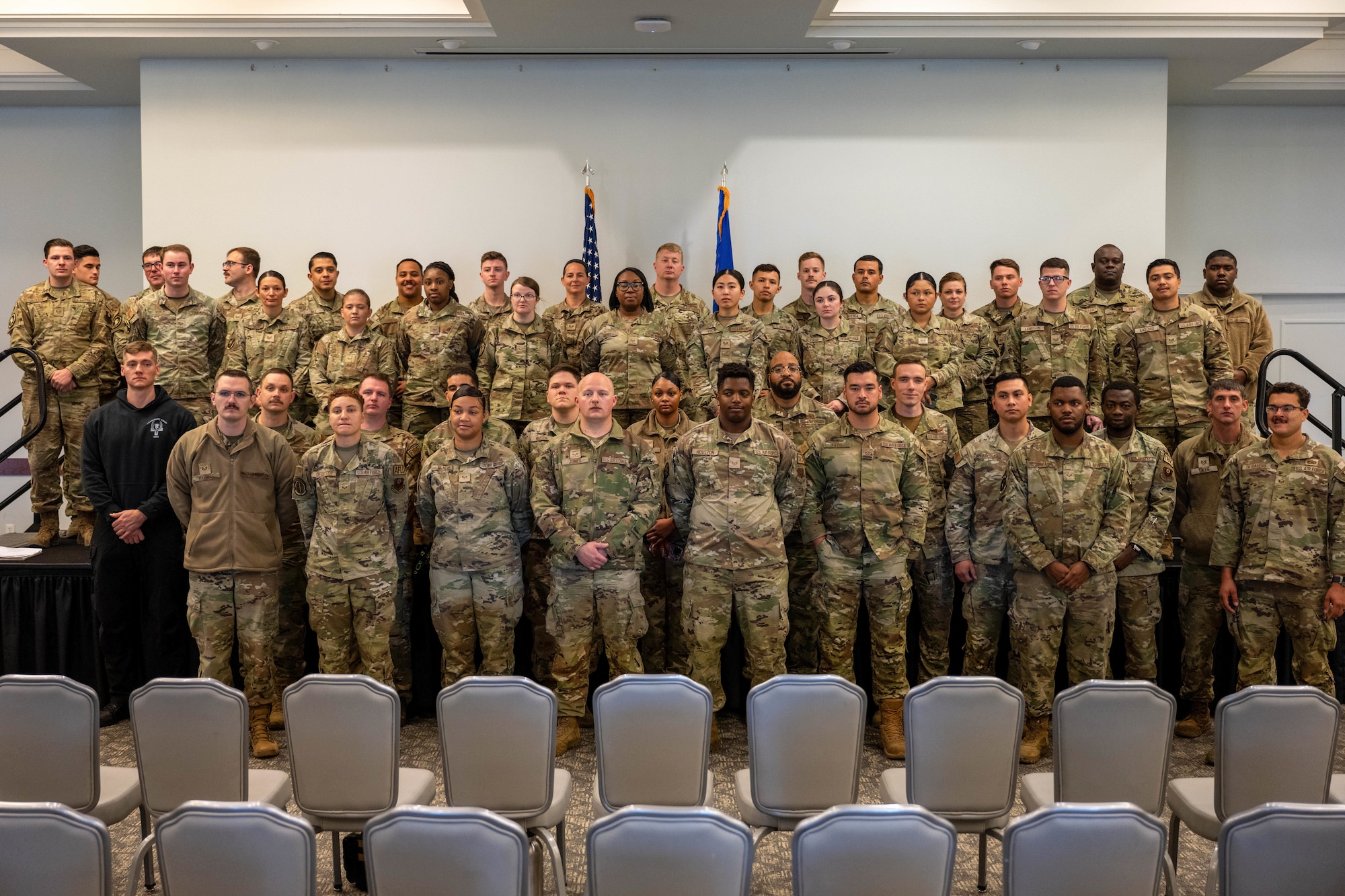 A group of Airmen pose for a photo