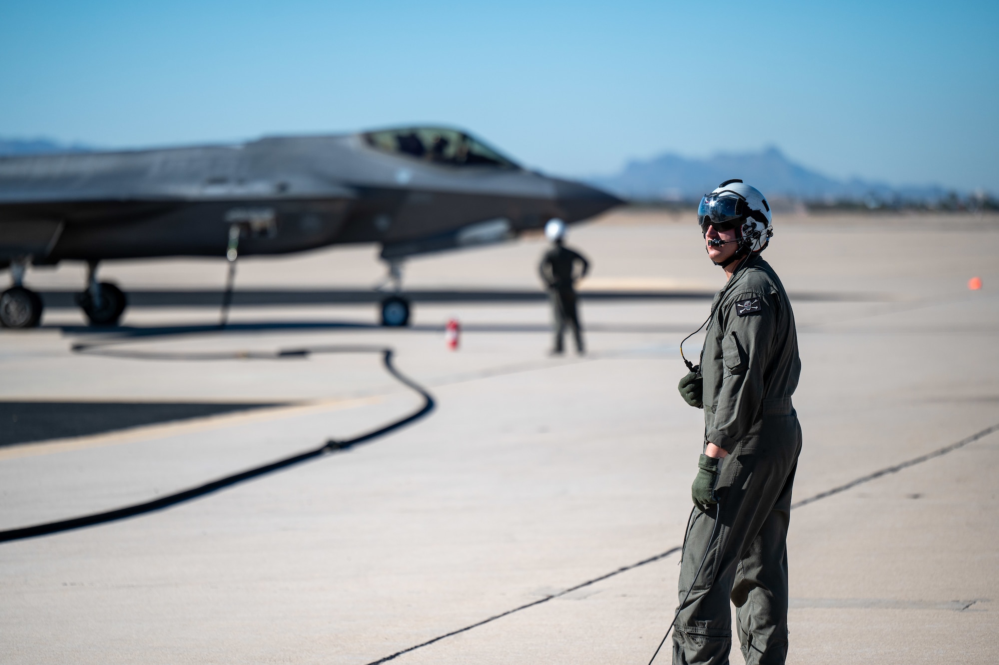 U.S. Marines refuel an F-35 Lightning II aircraft, assigned to the 56th Fighter Wing’s 62nd Fighter Squadron, on the flightline at Davis-Monthan Air Force Base, Ariz., Nov. 14, 2024. The Marines and F-35s participated in Exercise Desert Hammer 25-1, to include a forward area refueling point training. (U.S. Air Force photo by Senior Airman Devlin Bishop)