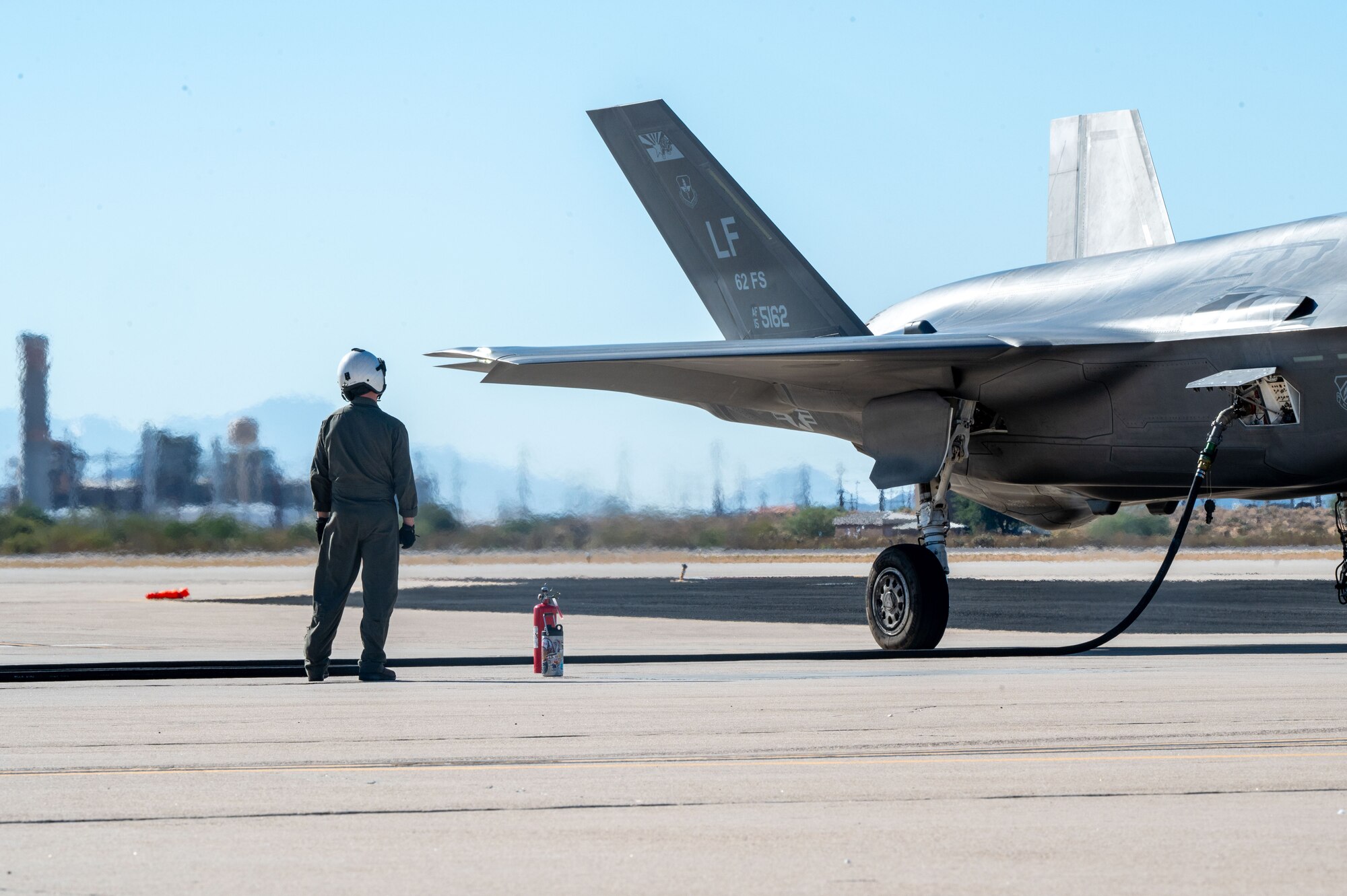 U.S. Marines refuel an F-35 Lightning II aircraft, assigned to the 56th Fighter Wing’s 62nd Fighter Squadron, on the flightline at Davis-Monthan Air Force Base, Arizona, Nov. 14, 2024. The Marines and F-35s participated in Exercise Desert Hammer 25-1, to include a forward area refueling point training. (U.S. Air Force photo by Senior Airman William Finn V)