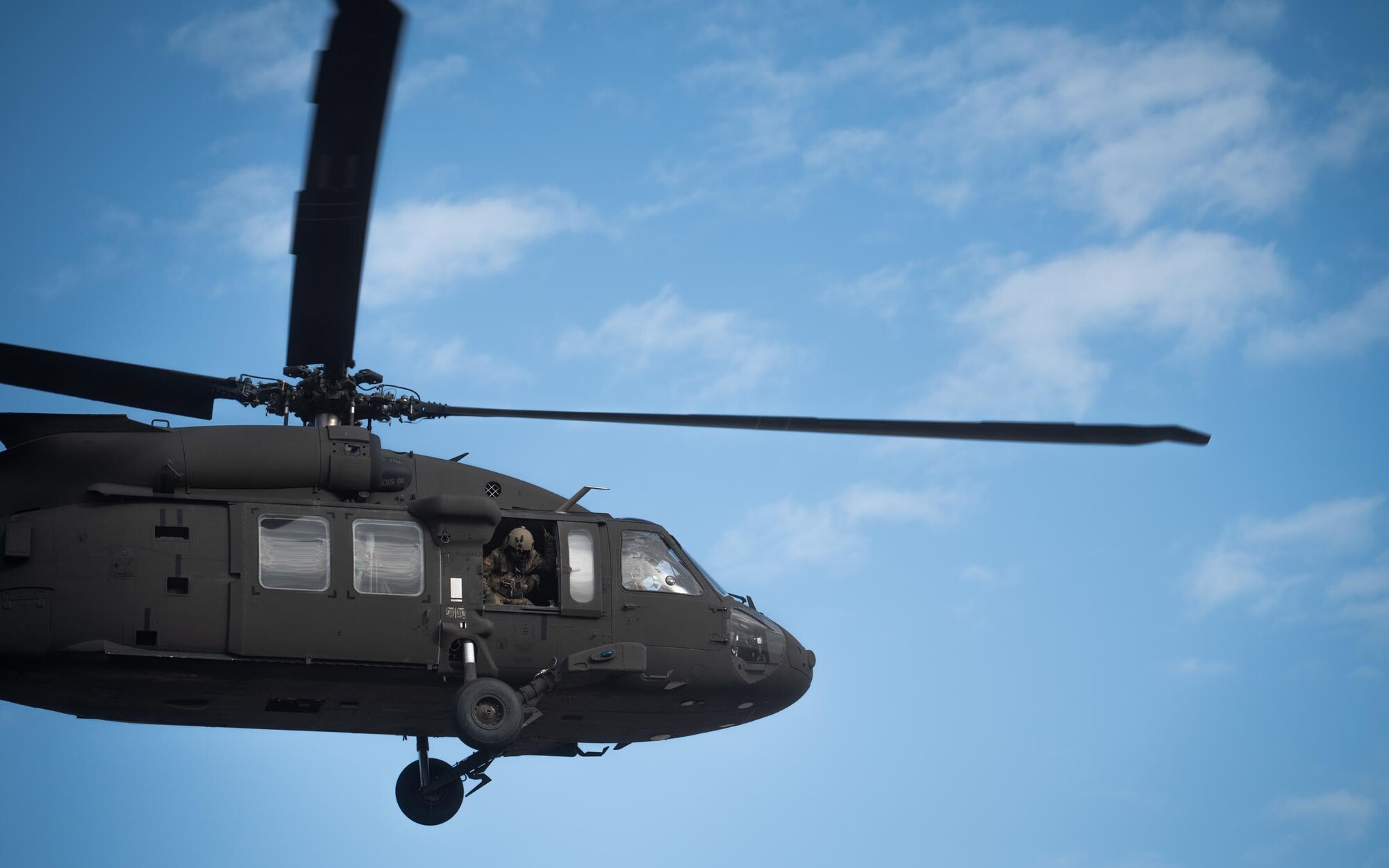 An Arizona Army National Guard UH-60 Black Hawk Helicopter takes off during Exercise Desert Hammer 25-1 at Auxiliary Field 6 near Gila Bend, Ariz., Nov. 16, 2024. This large-scale exercise showcases the adaptability of Mission Ready Airmen, advancing the skills needed to thrive in the rapidly evolving challenges of global competition. (U.S. Air Force photo by Senior Airman Jacob Dastas)