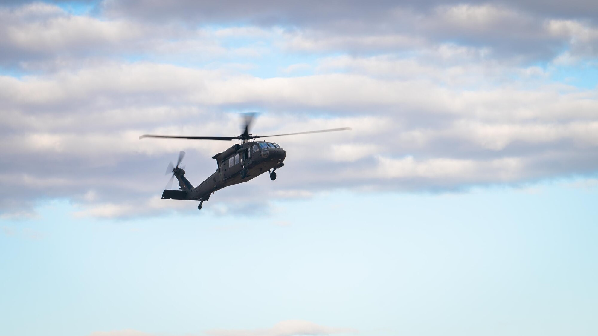 An Arizona Army National Guard UH-60 Black Hawk Helicopter takes flight during Exercise Desert Hammer 25-1 at Auxiliary Field 6 near Gila Bend, Ariz., Nov. 16, 2024. This large-scale exercise showcases the adaptability of Mission Ready Airmen, advancing the skills needed to thrive in the rapidly evolving challenges of global competition. (U.S. Air Force photo by Senior Airman Jacob Dastas)