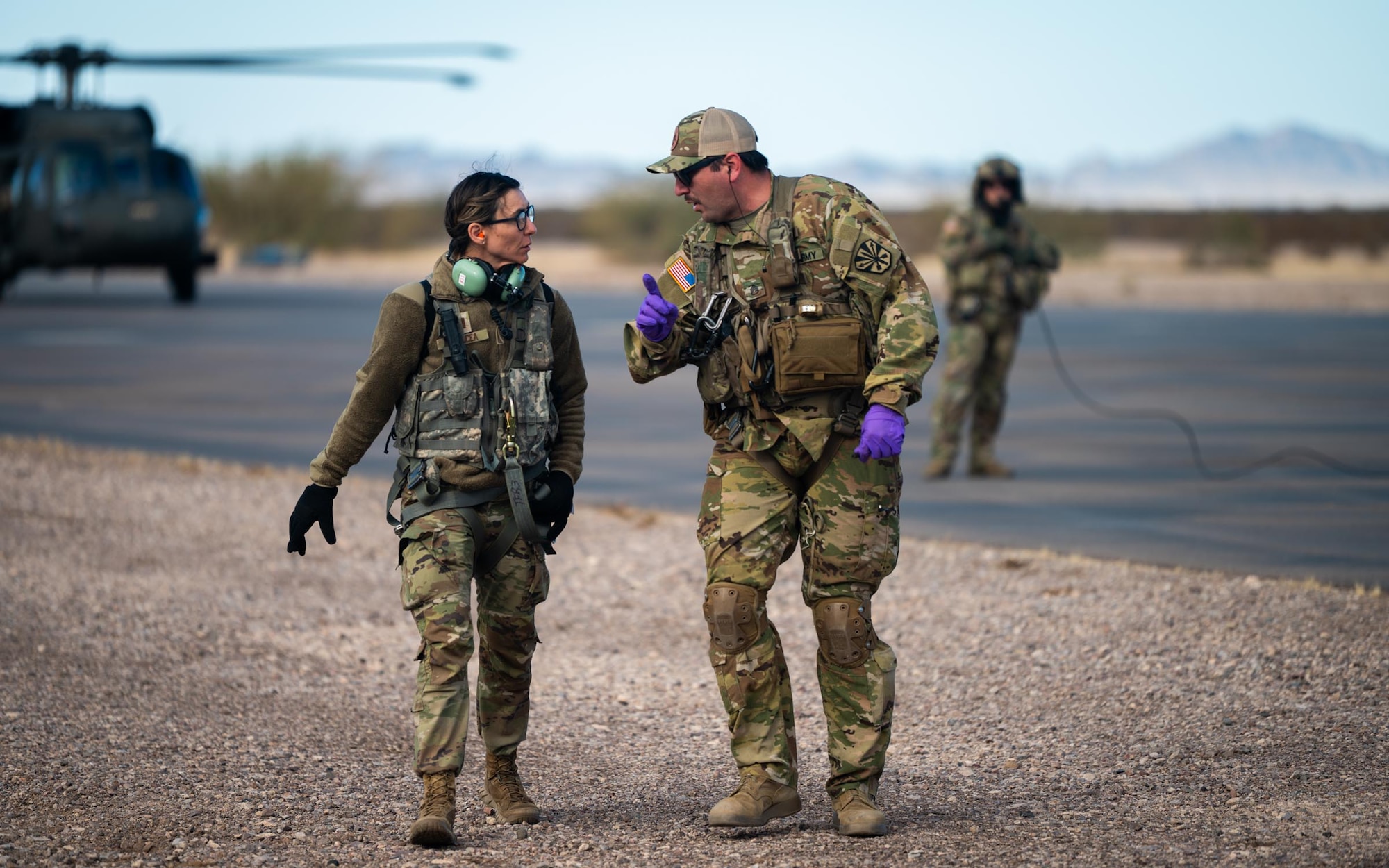 A 944th Fighter Wing U.S. Air Force Reserve Citizen Airmen and Arizona Army National Guard Soldier collaborate while conducting Critical Care Air Transport Team (CCATT) training during Exercise Desert Hammer 25-1 at Auxiliary Field 6 near Gila Bend, Ariz., Nov. 16, 2024. Set against the unmatched backdrop of the Barry M. Goldwater Range, Desert Hammer leverages Arizona’s strategic geography to provide realistic combat training for U.S. and allied forces. (U.S. Air Force photo by Senior Airman Jacob Dastas)