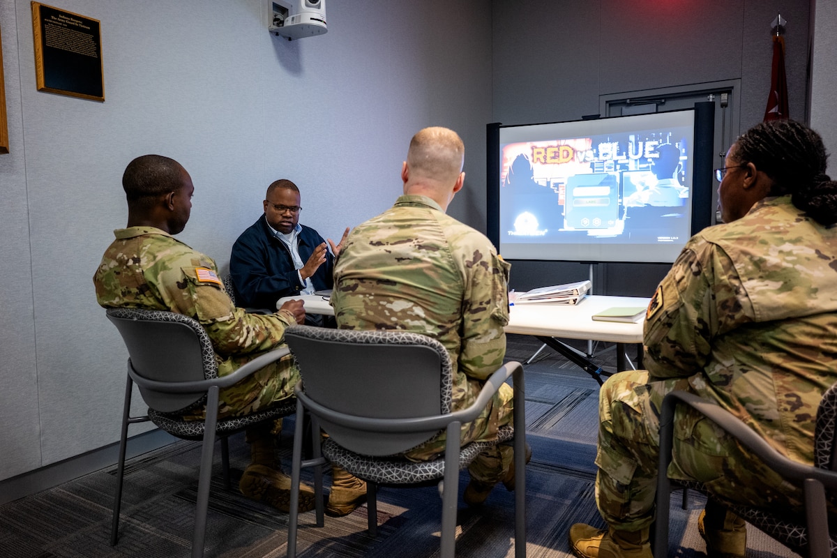 Soldiers assigned to the National Guard Bureau take part in a Cybersecurity Awareness Month event at the Herbert R. Temple Army National Guard Readiness Center, Arlington Hall Station, in Arlington, Virginia, in October. The Guard brings a variety of skill sets to the cyber field and developed the Bring Your Own Device application, which allows Soldiers and Airmen to connect personal phones, tablets and other devices to the Defense Department network. The app was approved  Army- and Air Force-wide earlier this year after more than two years of development and testing.