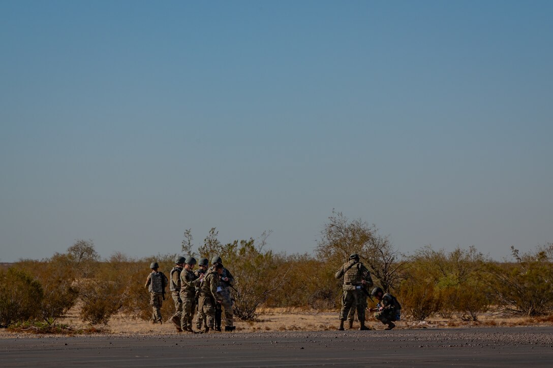 944th Fighter Wing Reserve Citizen Airmen monitor the release of cargo from a U.S. Marine Corps KC-130J Hercules during Exercise Desert Hammer 25-1 at Auxiliary Airfield 6 near Gila Bend, Ariz., Nov. 14, 2024. Through joint and multinational collaboration, Desert Hammer tests the ability of over 700 participants and 131 aircraft to operate, defend, and sustain airbases under austere conditions. (U.S. Air Force photo by Tech. Sgt. Tyler J. Bolken)