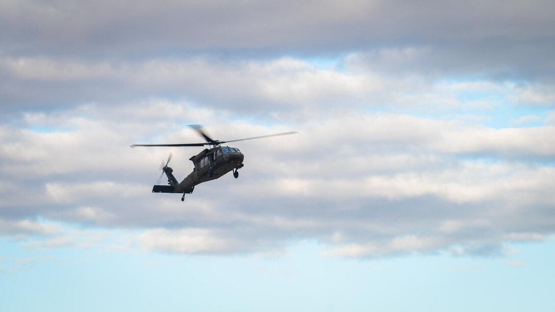 An Arizona Army National Guard UH-60 Black Hawk Helicopter takes flight during Exercise Desert Hammer 25-1 at Auxiliary Field 6 near Gila Bend, Ariz., Nov. 16, 2024. This large-scale exercise showcases the adaptability of Mission Ready Airmen, advancing the skills needed to thrive in the rapidly evolving challenges of global competition. (U.S. Air Force photo by Senior Airman Jacob Dastas)
