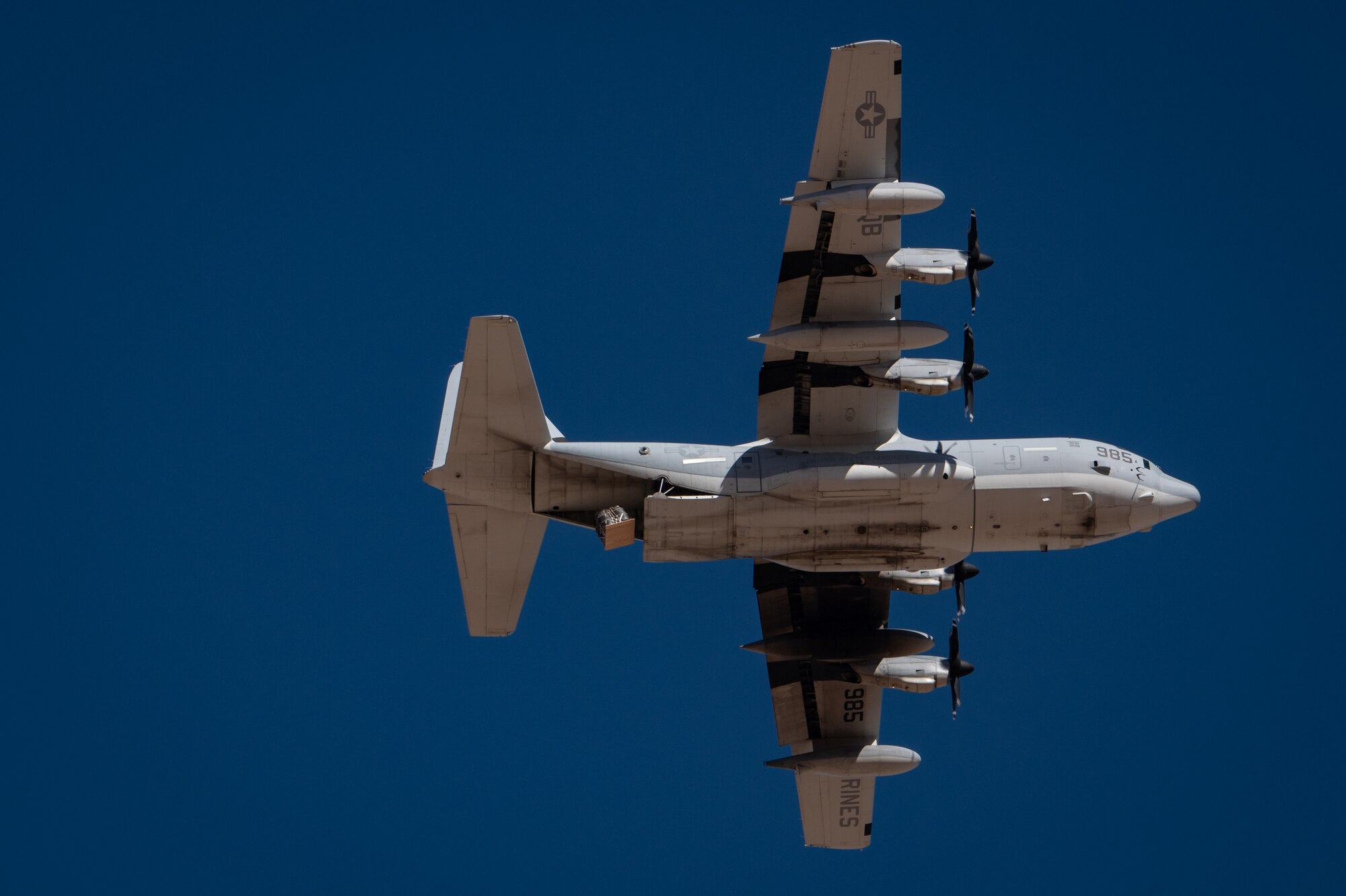 Cargo is released from a U.S. Marine Corps KC-130J Hercules during a training mission for Exercise Desert Hammer 25-1 at Auxiliary Airfield 6 near Gila Bend, Ariz., Nov. 14, 2024. Set against the backdrop of the Barry M. Goldwater Range, Desert Hammer provides vital combat readiness training. (U.S. Air Force photo by Tech. Sgt. Tyler J. Bolken)