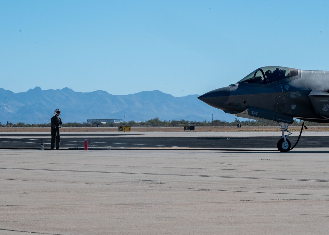 U.S. Marines refuel an F-35 Lightning II aircraft, assigned to the 56th Fighter Wing’s 62nd Fighter Squadron, on the flightline at Davis-Monthan Air Force Base, Arizona, Nov. 14, 2024. The Marines and F-35s participated in Exercise Desert Hammer 25-1, to include a forward area refueling point training. (U.S. Air Force photo by Senior Airman William Finn V)