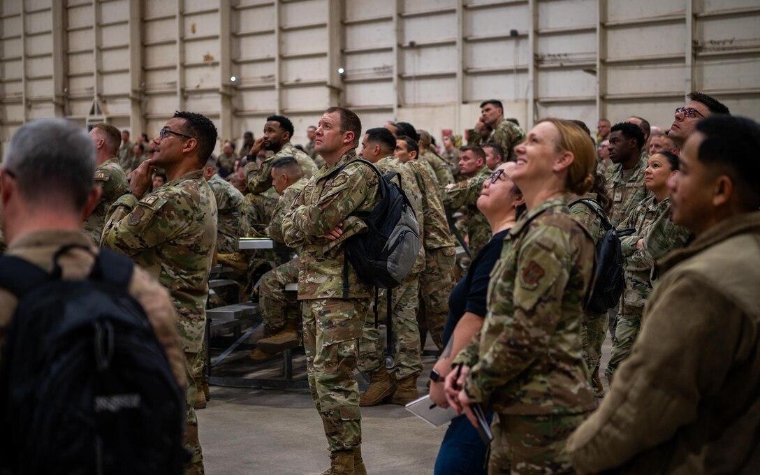 944th Fighter Wing Reserve Citizen Airmen gather for a Ready Start Brief as part of Exercise Desert Hammer 25-1 at Luke Air Force Base, Ariz., Nov. 13, 2024. This large-scale exercise showcases the adaptability of Mission Ready Airmen, advancing the skills needed to thrive in the rapidly evolving challenges of global competition. (U.S. Air Force photo by Senior Airman Jacob Dastas)