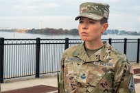 U.S. Space Force Sgt. Jordan Dunkerson, Honor Guard training flight 25-A student, stands at attention at the riverfront on Joint Base Anacostia-Bolling, Washington, D.C, Nov. 20, 2024. A training flight class lasts for 40 days or 280 training hours and on average holds 15 students. (U.S. Air Force photo by Staff Sgt. Demond Mcghee)