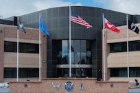 Photo of Space Base Delta 1 headquarters building at Peterson Space Force Base, Colorado.