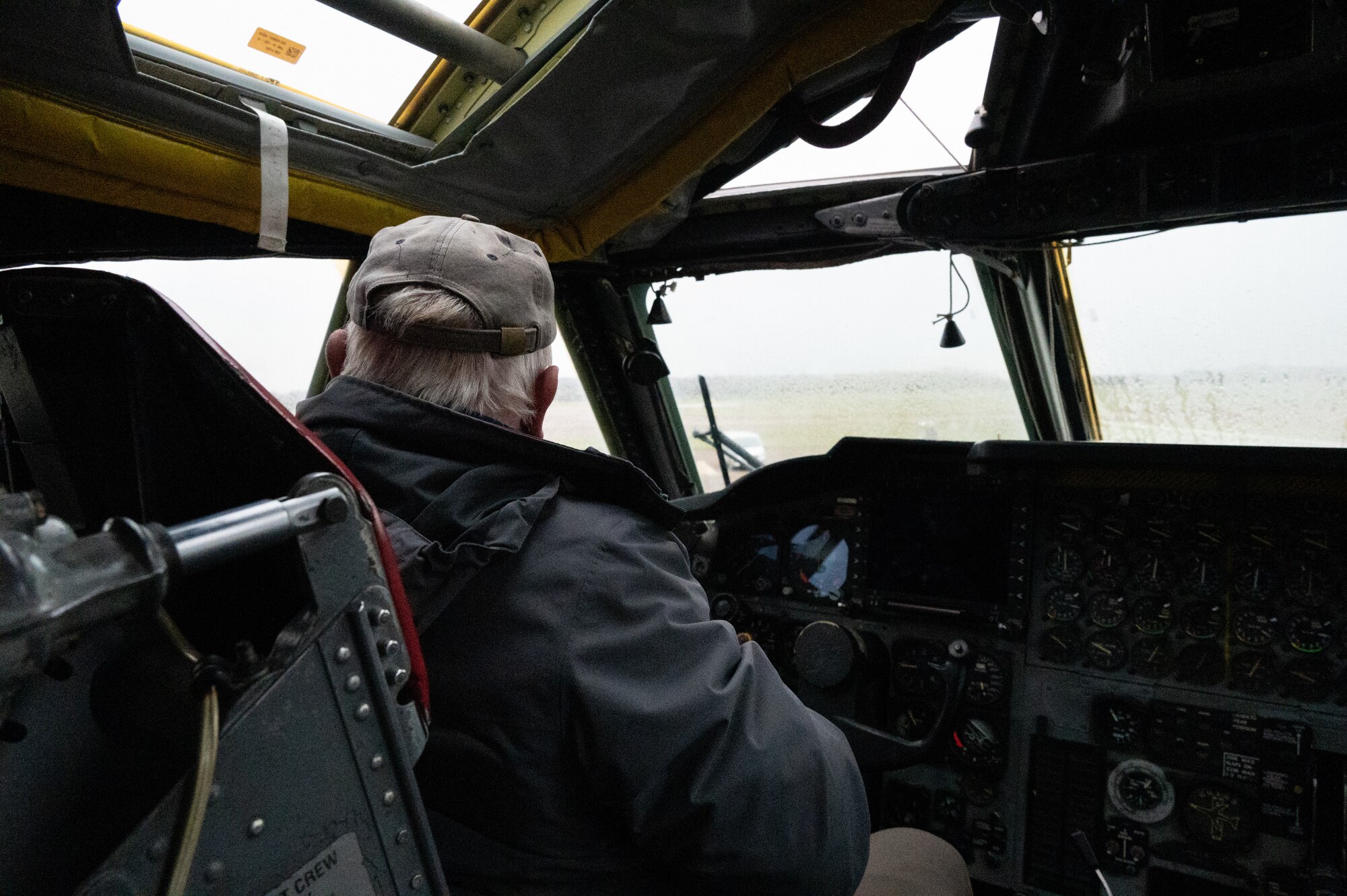 A Pathfinder sits in the cockpit of a B-52 Stratofortress