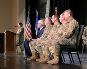 Wisconsin National Guard senior leaders join Wisconsin Gov. Tony Evers at a deployment sendoff ceremony for the 732nd Combat Support Sustainment Battalion’s Headquarters and Headquarters Company Nov. 30, 2024, at Tomah High School in Tomah, Wisconsin. Following pre-mobilization training, the Guardsmen will deploy to the U.S. Central Command area of operations to synchronize and control logistics operations supporting Operation Inherent Resolve.