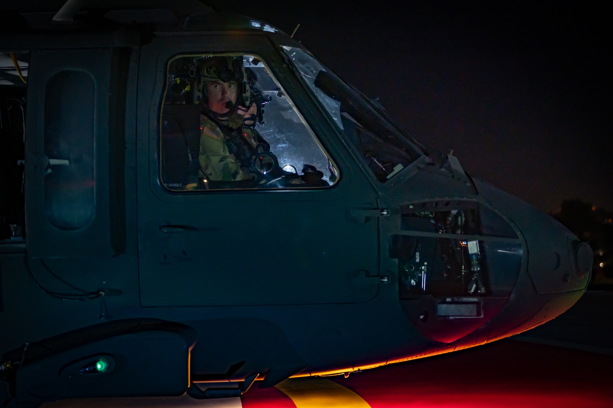 An Arizona Army National Guard UH-60 Black Hawk helicopter pilot waits during a patient transport operation at HonorHealth Scottsdale Osborn Medical Center in Scottsdale, Ariz., Nov. 14, 2024, as part of Exercise Desert Hammer 25-1. Set against the unmatched backdrop of the Barry M. Goldwater Range, Desert Hammer leverages Arizona’s strategic geography to provide realistic combat training for U.S. and allied forces. (U.S. Air Force photo by Tech. Sgt. Tyler J. Bolken)