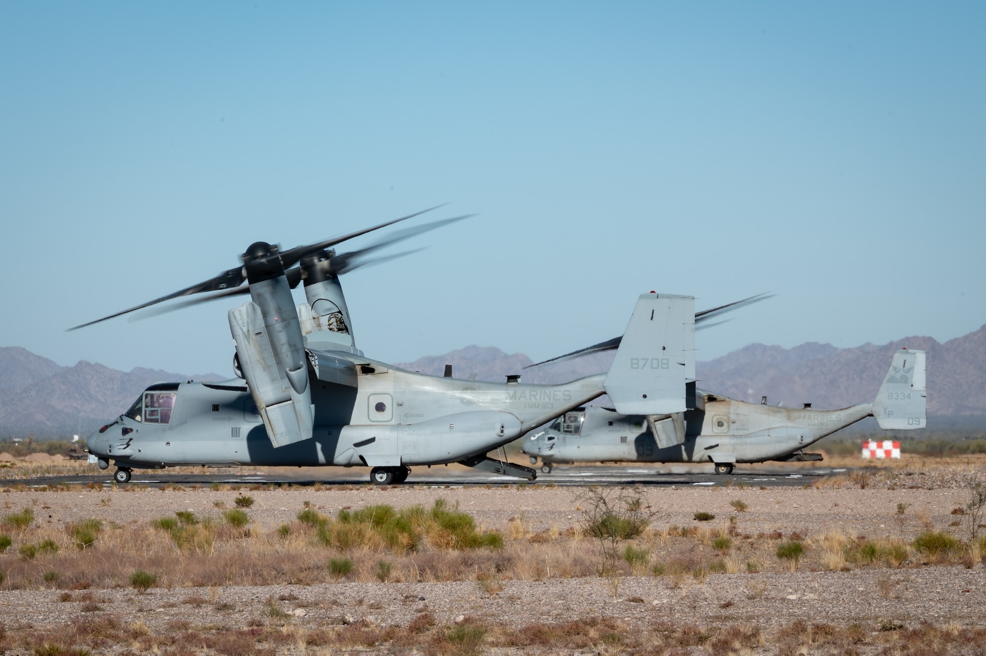 U.S. Marine Corps MV-22 Ospreys from Medium Tiltrotor Squadron 163 out of Marine Corps Air Station Miramar, Calif., prepare for simulated medical evacuation operations during Exercise Desert Hammer 25-1 at Gila Bend Air Force Auxiliary Field near Gila Bend, Ariz., Nov. 14, 2024. Through joint and multinational collaboration, Desert Hammer tests the ability of over 700 participants and 131 aircraft to operate, defend, and sustain airbases under austere conditions. (U.S. Air Force photo by Tech. Sgt. Tyler J. Bolken)