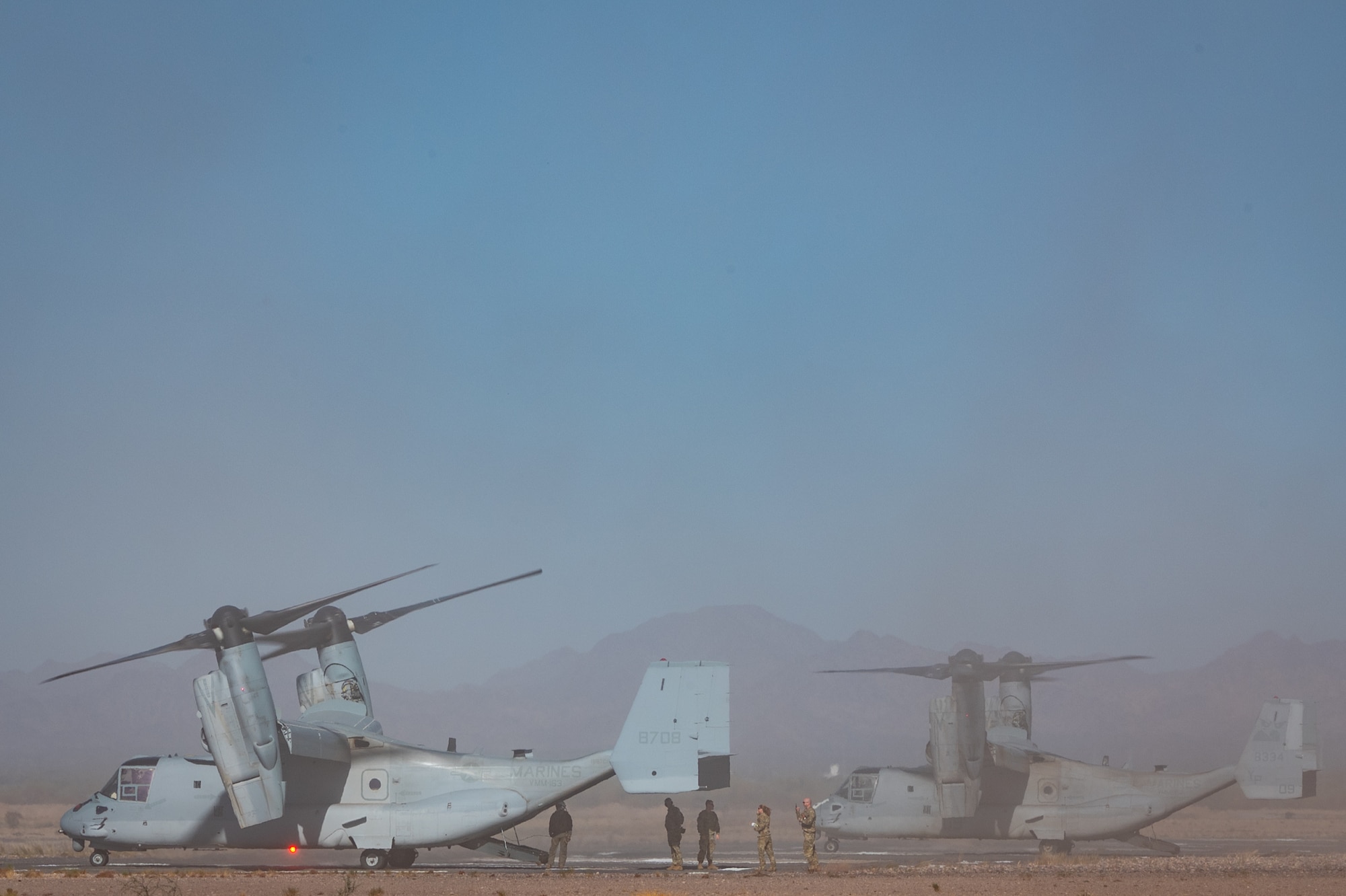 U.S. Marine Corps MV-22 Ospreys from Medium Tiltrotor Squadron 163 out of Marine Corps Air Station Miramar, Calif., prepare for simulated medical evacuation operations during Exercise Desert Hammer 25-1 at Gila Bend Air Force Auxiliary Field near Gila Bend, Ariz., Nov. 14, 2024. Exercise Desert Hammer 25-1 emphasizes the U.S. Air Force Reserve’s commitment to readiness by integrating Agile Combat Support and Large Force Exercise capabilities in a contested environment. (U.S. Air Force photo by Tech. Sgt. Tyler J. Bolken)