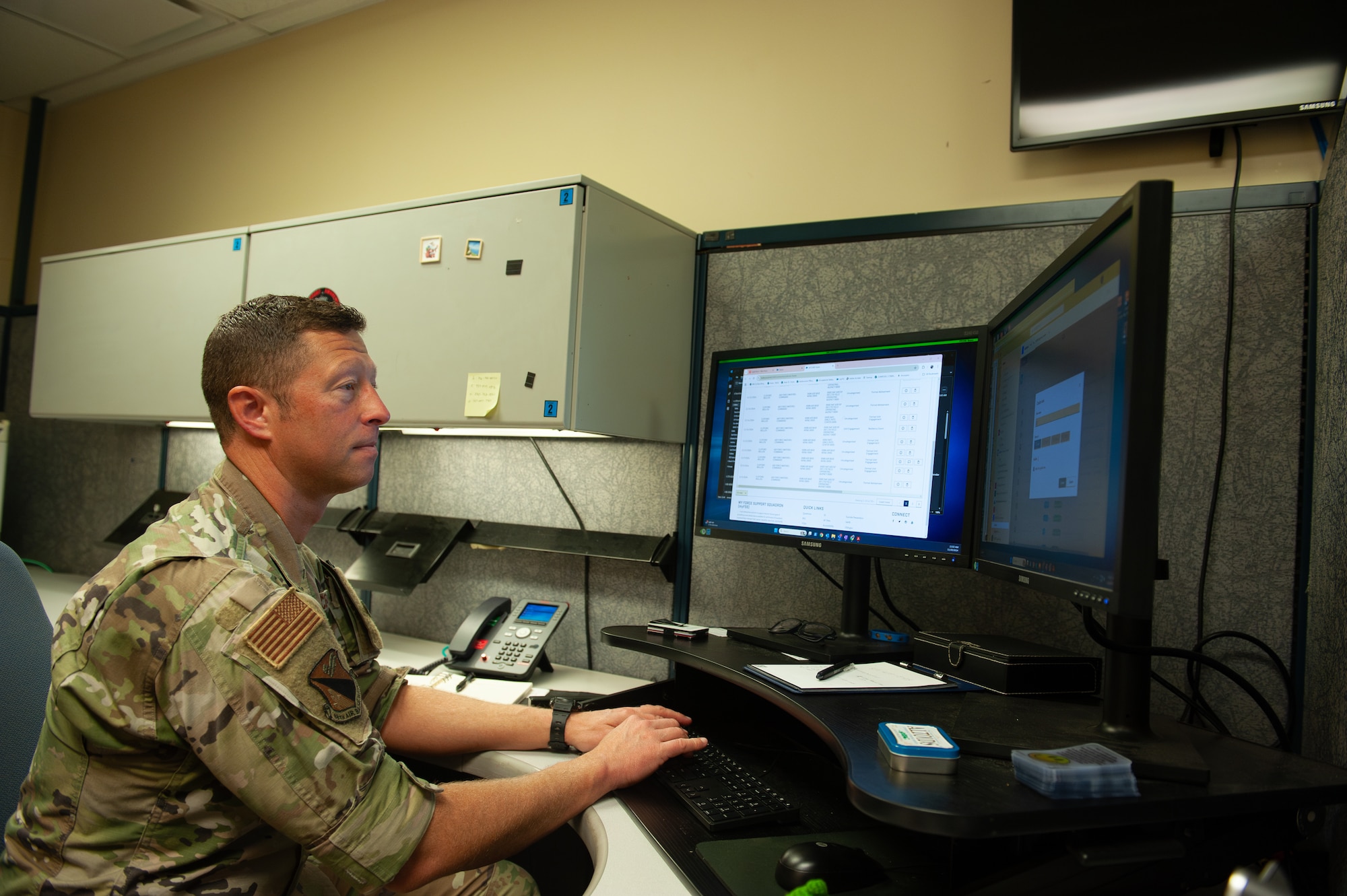 Capt. Cliff Mullen works at his desk.