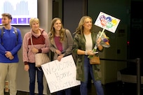 Family and friends wait for loved ones to arrive at Abraham Lincoln Capital Airport in Springfield, Illinois Nov. 21.