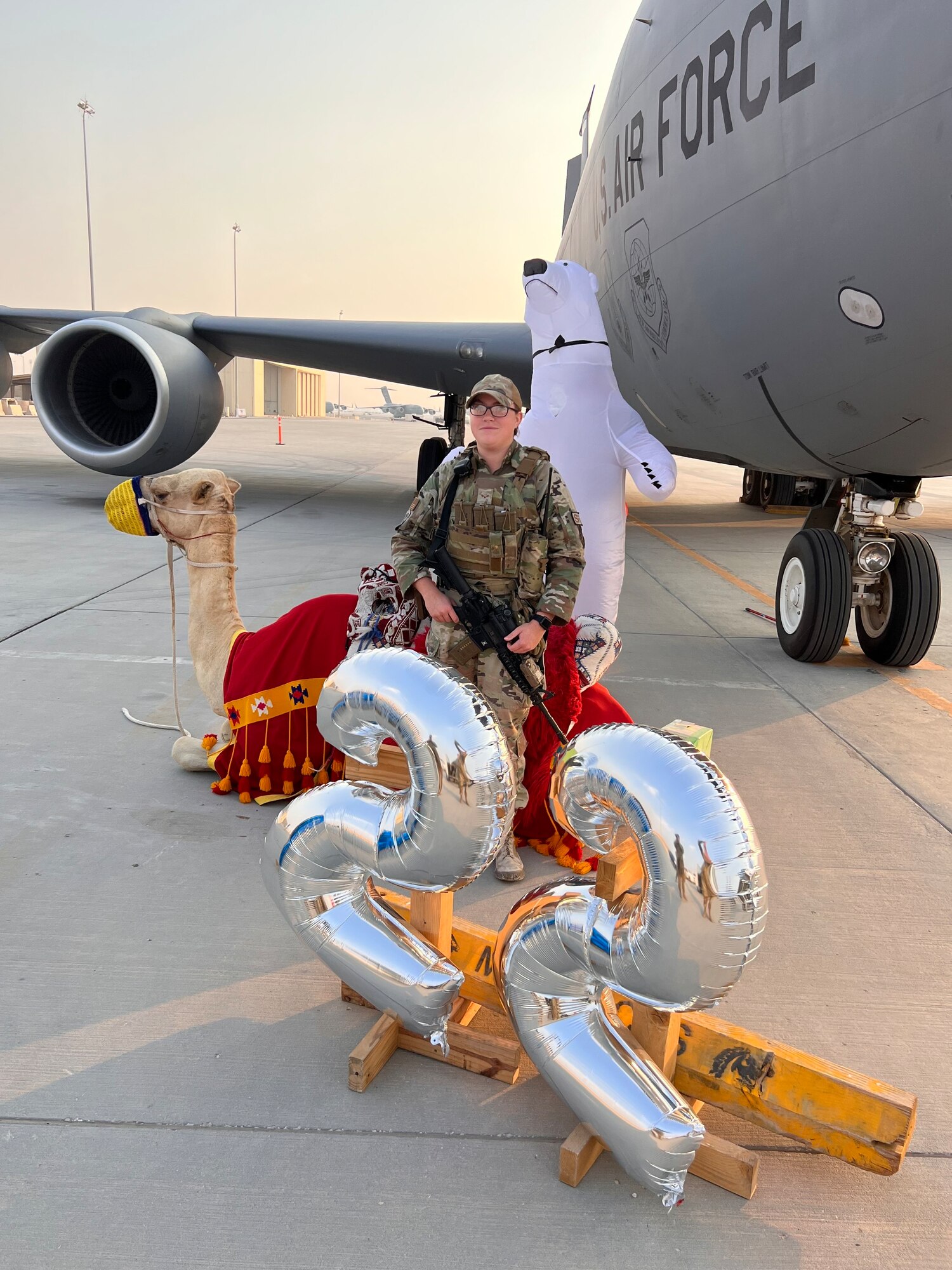 Senior Airman Madalyn Kime, 22nd Security Forces Squadron entry controller, celebrates the winter holidays while deployed to an undisclosed location in the U.S. Central Command area of responsibility. (Courtesy Photo)