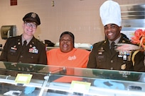 Leaders and DFAC staff thank the troops during Thanksgiving