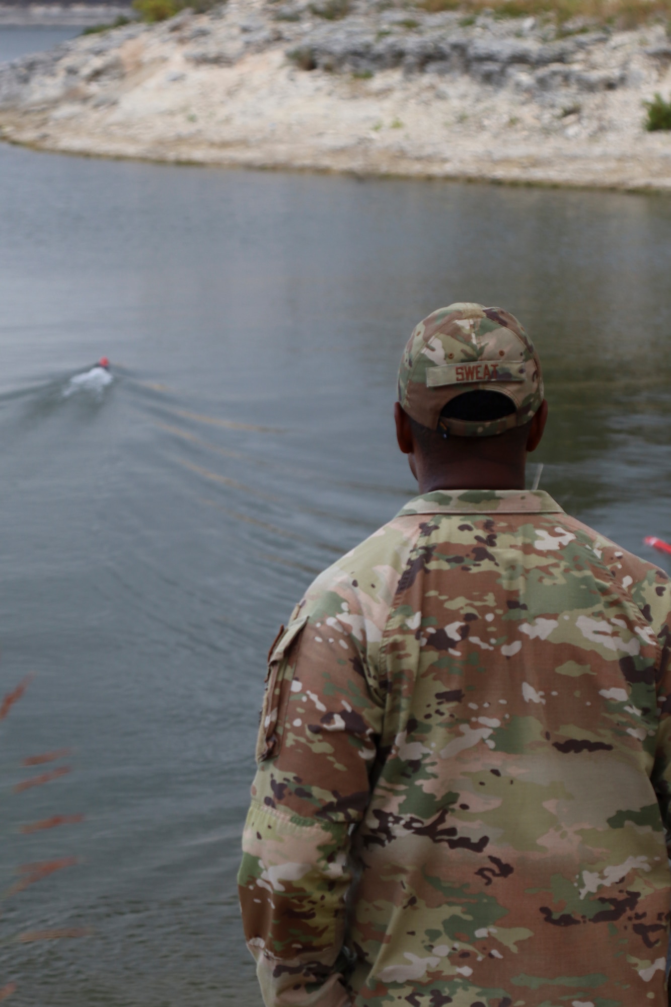 Airman watches environmental sensing drones