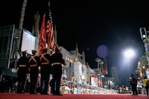 U.S. Marines with 4th Marine Division Color Guard participate in the 92nd Hollywood Parade in Hollywood, California, Dec. 1, 2024. Marines participated in the parade to improve community relations, increase morale, and demonstrate holiday spirit. (U.S. Marine Corps photo by Cpl. Sarah M. Grawcock)