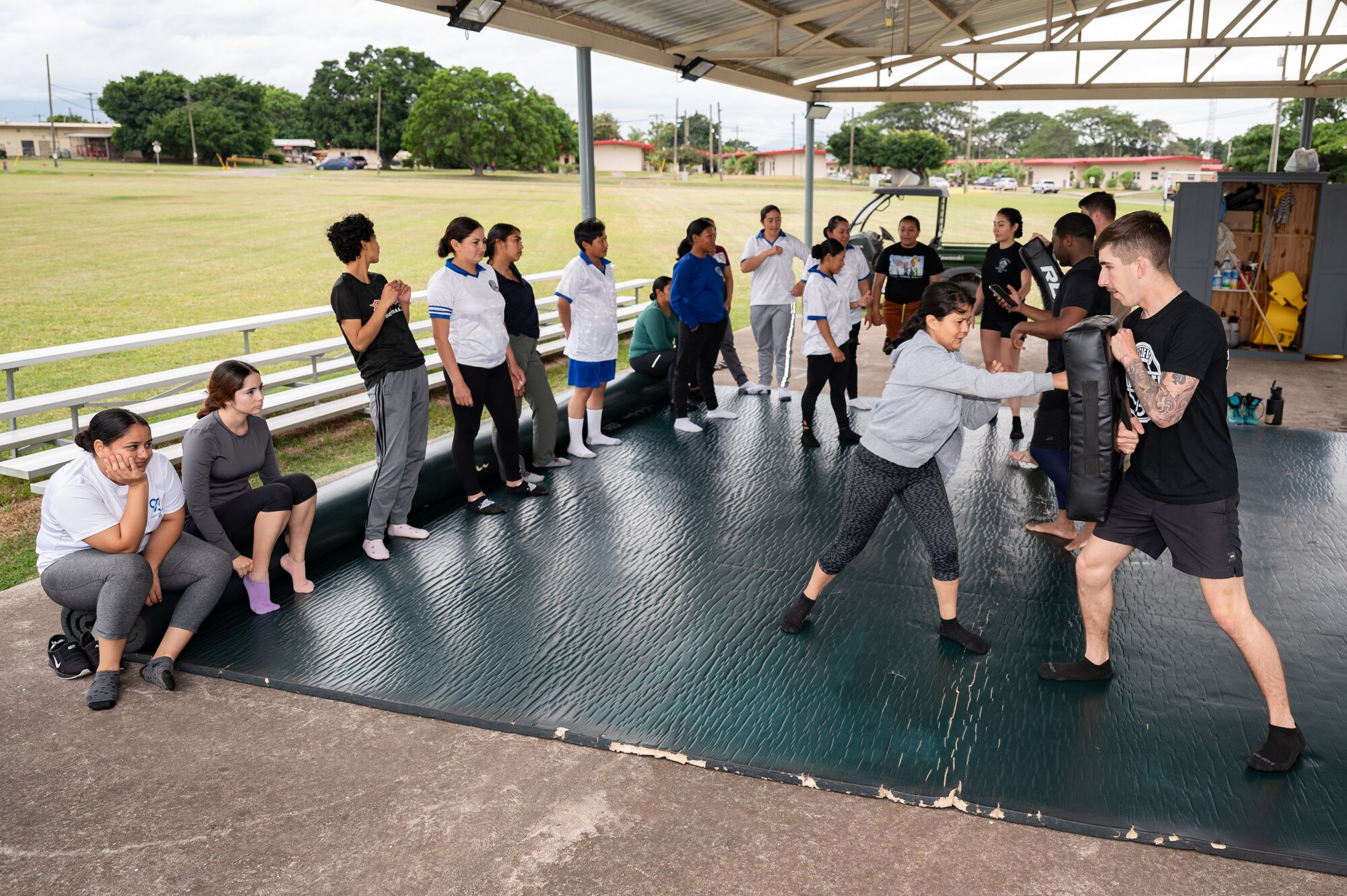 EmpowerHER combatives instructors teach Honduran Air Force service members combatives during a class at Soto Cano Air Base, Honduras, Dec. 3, 2024.