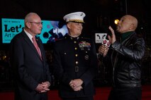 U.S. Marine Corps Commander of Marine Corps Forces Reserve and Marine Corps Forces South, Lt. Gen. Leonard Anderson and the president and CEO of Marines Toys for Tots Foundation, U.S. Marine Corps retired Lt. Gen. James Lester, speak in an interview with Montel Williams, one of the hosts for the 92nd Hollywood Parade in Hollywood, California, Dec. 1, 2024. Marines participated in the parade to improve community relations, increase morale, and demonstrate holiday spirit. (U.S. Marine Corps photo by Cpl. Sarah M. Grawcock)