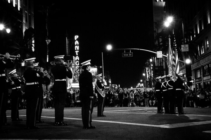 U.S. Marines with 4th Marine Division Color Guard and Marine Band San Diego participate in the 92nd Hollywood Parade in Hollywood, California, Dec. 1, 2024. Marines participated in the parade to improve community relations, increase morale, and demonstrate holiday spirit. (U.S. Marine Corps photo by Cpl. Sarah M. Grawcock)