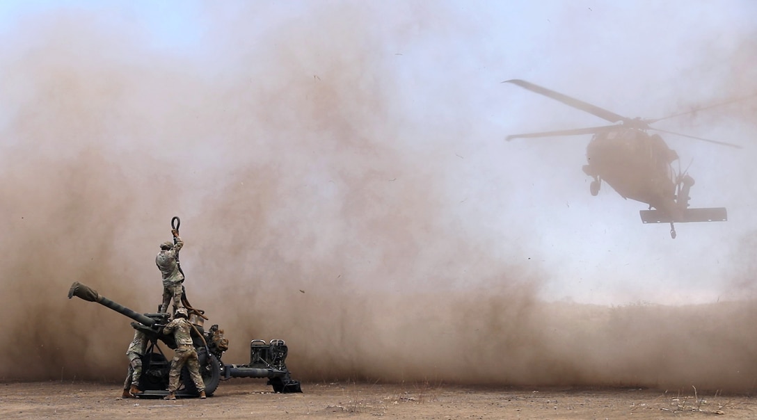 U.S. Army Soldiers from Bravo Company, 2-25th Aviation Regiment, 25th Combat Aviation Brigade, conduct the sling load training exercise during Super Garuda Shield 2024, Sept. 1, 2024.