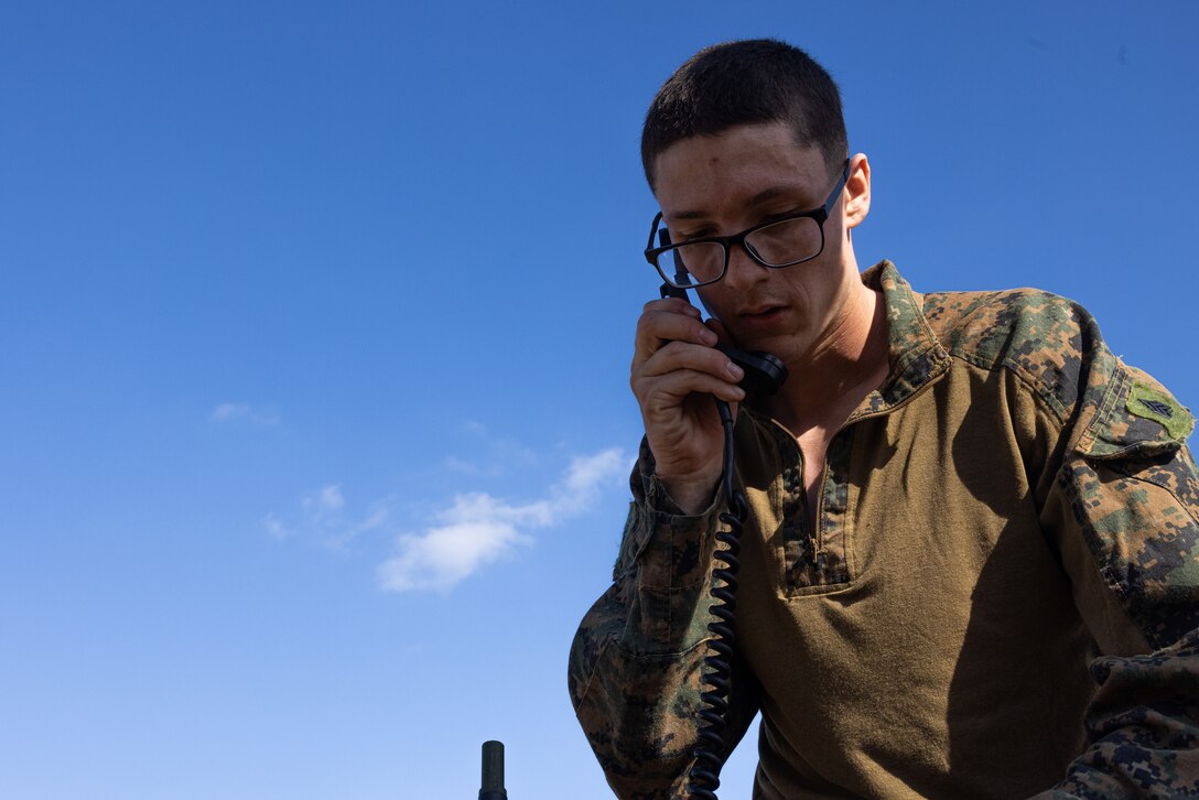 U.S. Marine Corps Sgt. Zachary Green with Battalion Landing Team 2/4, 31st Marine Expeditionary Unit, conducts a radio check during the Best Radio Operator competition at Camp Hansen, Okinawa, Nov. 27, 2024. Marines with the 31st MEU participated in a two-day event to determine the best radio operator out of a pool of 8 teams. The 31st MEU, the Marine Corps’ only continuously forward-deployed MEU, provides a flexible and lethal force, ready to perform a wide range of military operations as the premiere crisis response force in the Indo-Pacific region. Green is a native of North Carolina. (U.S. Marine Corps photo by Lance Cpl. Raul Sotovilla)