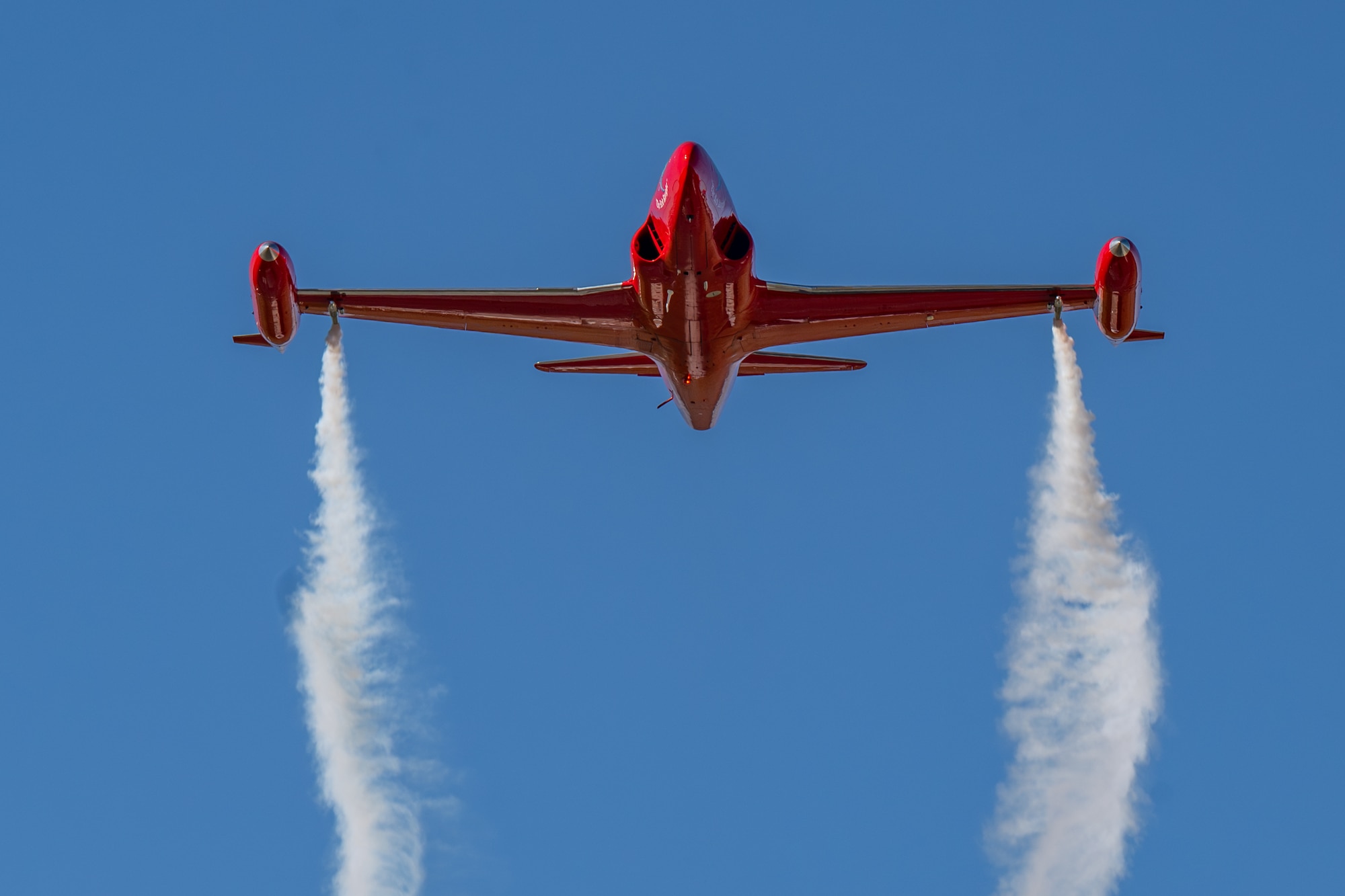 a plane is conducting a flyover