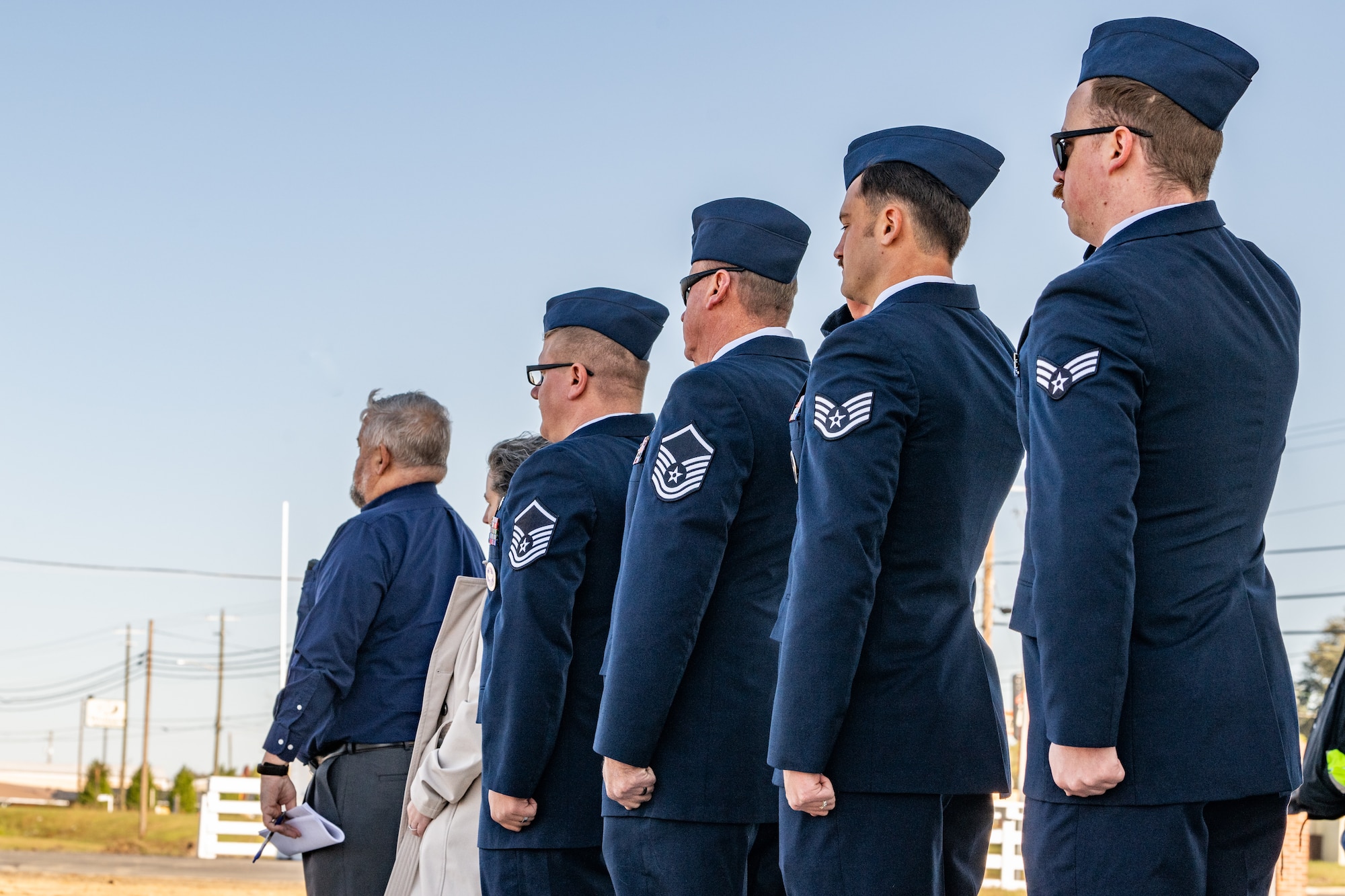 Airmen are raising a flag