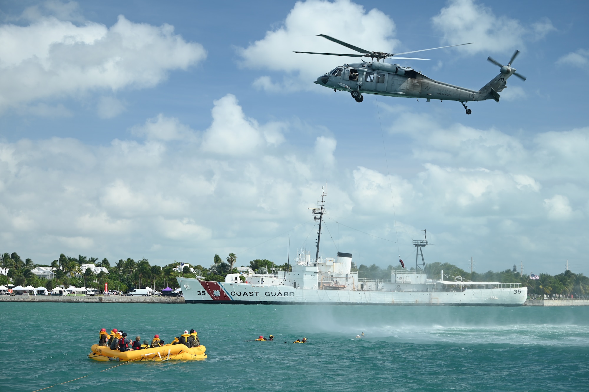 Reservists from the 445th Operation Group’s 89th Airlift Squadron, 445th Aeromedical Evacuation Squadron and 445th Operations Support Squadron along the U.S. Naval Air Station Key West Search and Rescue, Sector Key West Coast Guard and Key West Police Department participated in water survival training in Key West, Fla. Nov. 21, 2024. Over 80 reservists from Ops, 445th Maintenance Group, 445th Mission Support Group and 445th Airlift Wing medical squadrons participated in or provided support for the joint training event Nov. 21-22, 2024. (U.S. Air Force photo/Master Sgt. Patrick O’Reilly)