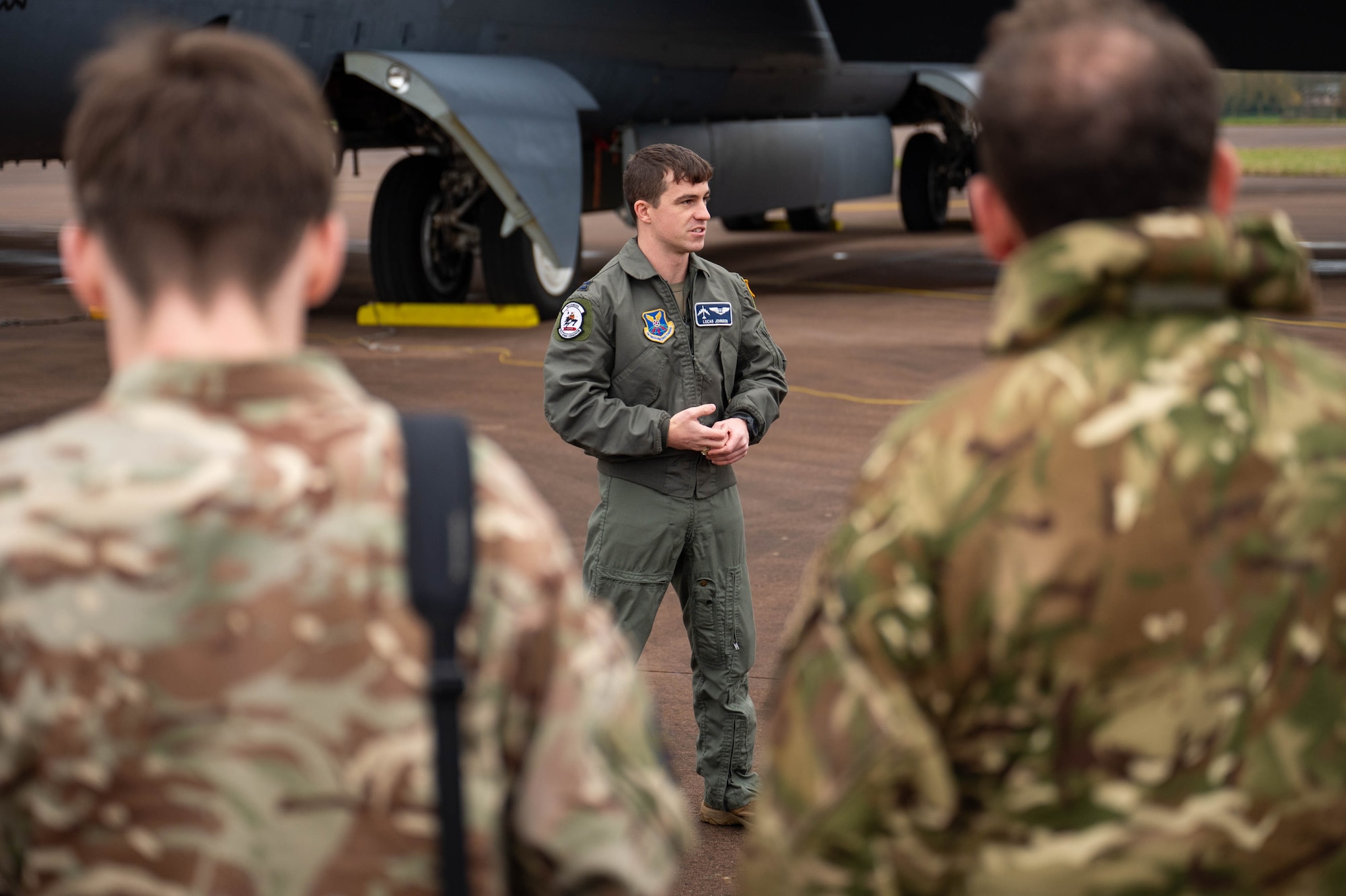 Capt. Lucas Johnson, 20th Expeditionary Bomb Squadron combat systems officer, speaks to Royal Air Force Air Cadets during a community outreach event Dec. 4, 2024, at RAF Fairford, England