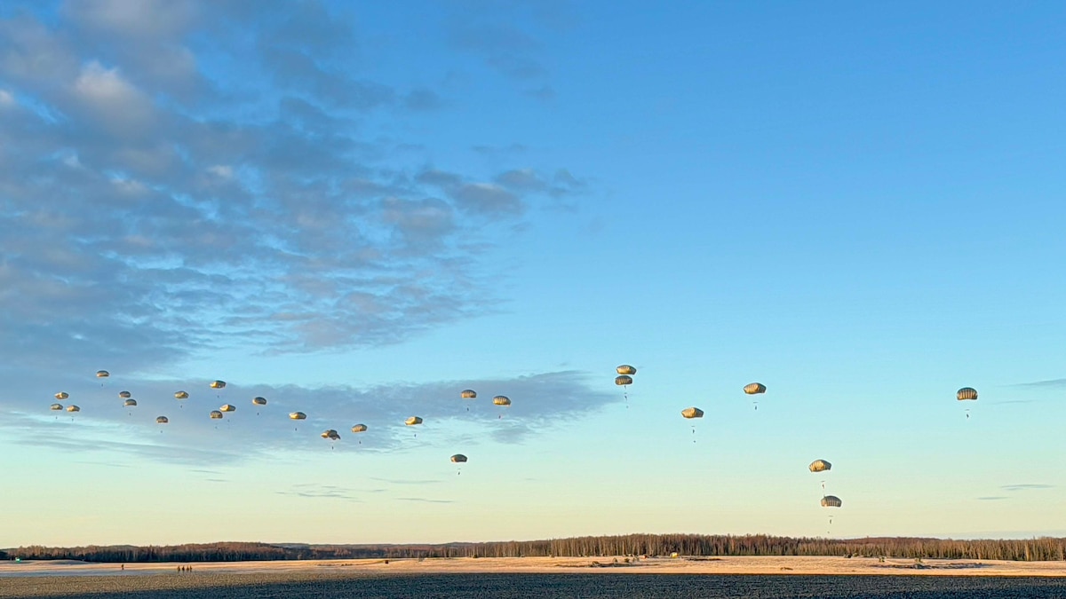 Paratroopers descend onto an Alaskan drop zone.