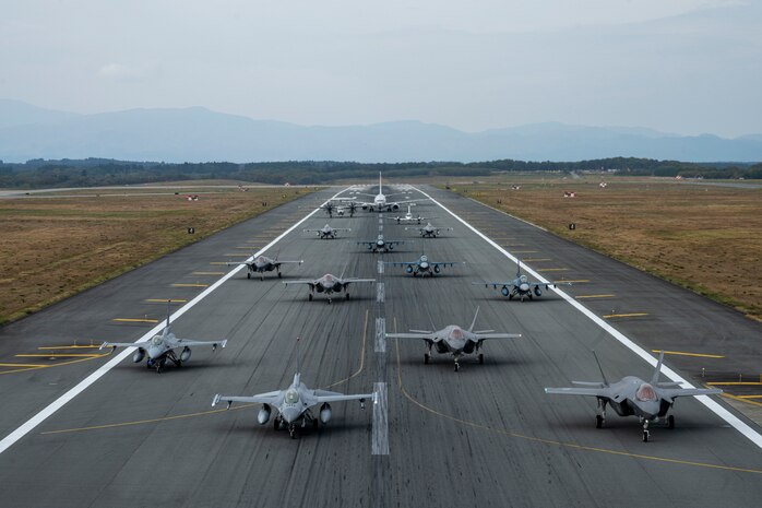 Four U.S. Air Force F-16 Fighting Falcons, four Japan Air Self-Defense Force (JASDF) F-35A Lightning II Joint Strike Fighters, four JASDF F-2s, one JASDF E-2D Hawkeye, one U.S. Navy C-12 Huron, and one U.S. Navy P-8 Poseidon perform a wing capabilities demonstration in support of Keen Sword 25 at Misawa Air Base, Japan, Nov. 1, 2024.