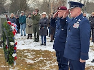 New York Air National Guard Brigadier General Gary Charlton and Command Chief Master Sergeant Michael Hewson salute  after the placing a wreath from the White House during the annual wreath laying ceremony marking the birthday of President Martin Van Buren in Kinderhook, New York, on Dec. 5, 2024.