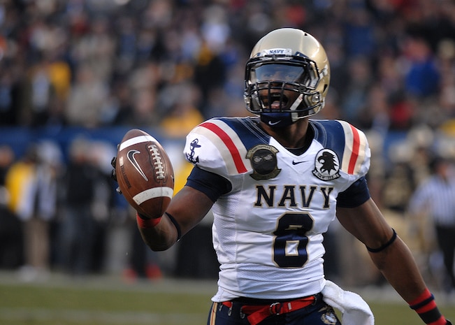 U.S. Naval Academy safety Wyatt Middleton (#8) runs into the end zone after recovering a fumble during the second quarter of the 111th annual Army-Navy football game at Lincoln Financial Field. The Midshipmen defeated the Golden Knights 31-17.