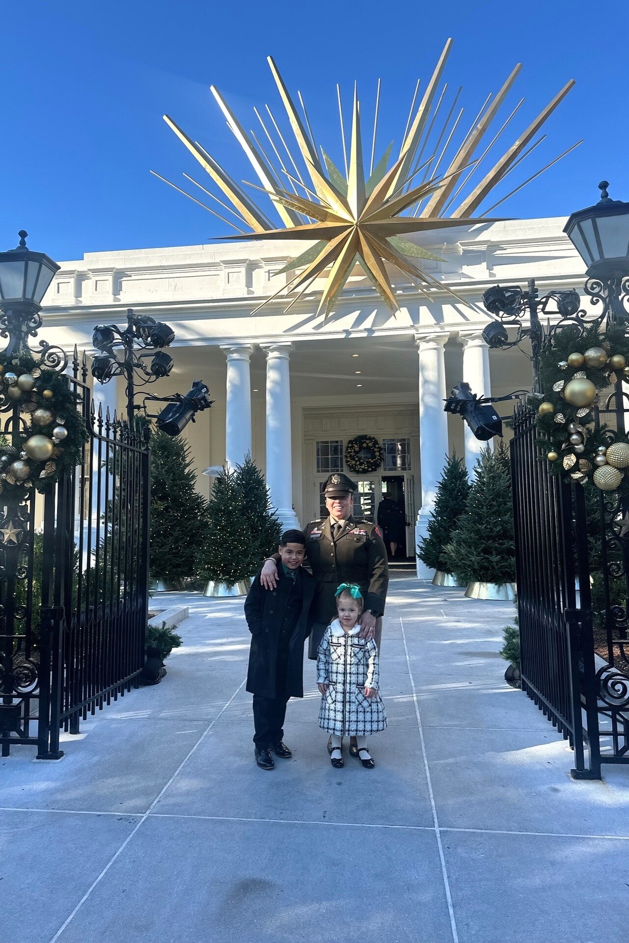 Capt. Nicole Barela-Vess and her children, Michael and Isabella, tour the White House in Washington, D.C., after attending First Lady Jill Biden’s Joining Forces Holiday Reception Dec. 2, 2024. (Courtesy photo)