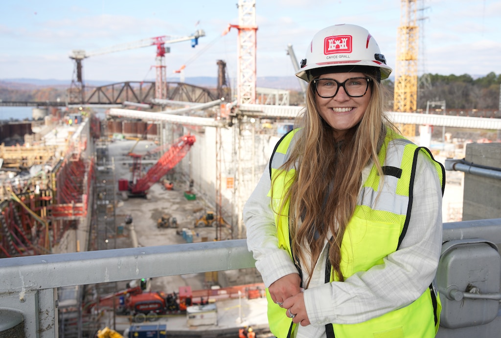 Cayce Grall, project manager-forward for the U.S. Army Corps of Engineers Nashville District’s Chickamauga Lock Replacement project in Chattanooga, Tennessee, poses for a photo overlooking the construction site, Dec. 3, 2024.