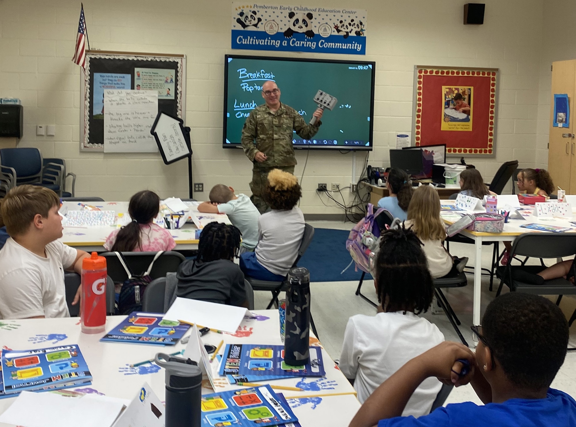 U.S. Air Force Tech. Sgt. Scott Seal, 305th Maintenance Group KC-46 VR training lead and hydraulics instructor, teaches STEM students about VR at Denbo-Crichton School, Browns Mills, N.J., July 16, 2024. Seal, stationed at Joint Base McGuire-Dix-Lakehurst, N.J., volunteers his time at local science, technology, engineering and math summer programs and camps providing students demonstrations and hands-on involvement in immersive technology. (Courtesy photo)